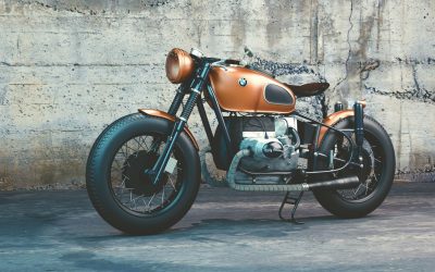 orange-and-black-bmw-motorcycle-before-concrete-wall-104842